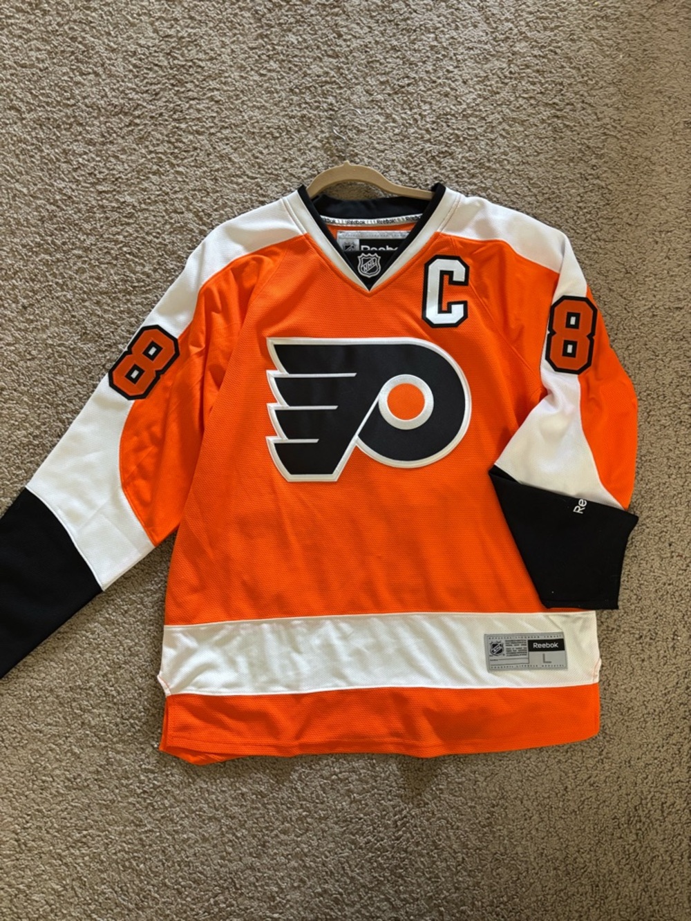 Reebok Philadelphia Flyers Orange, White & Black Captain Hockey Jersey